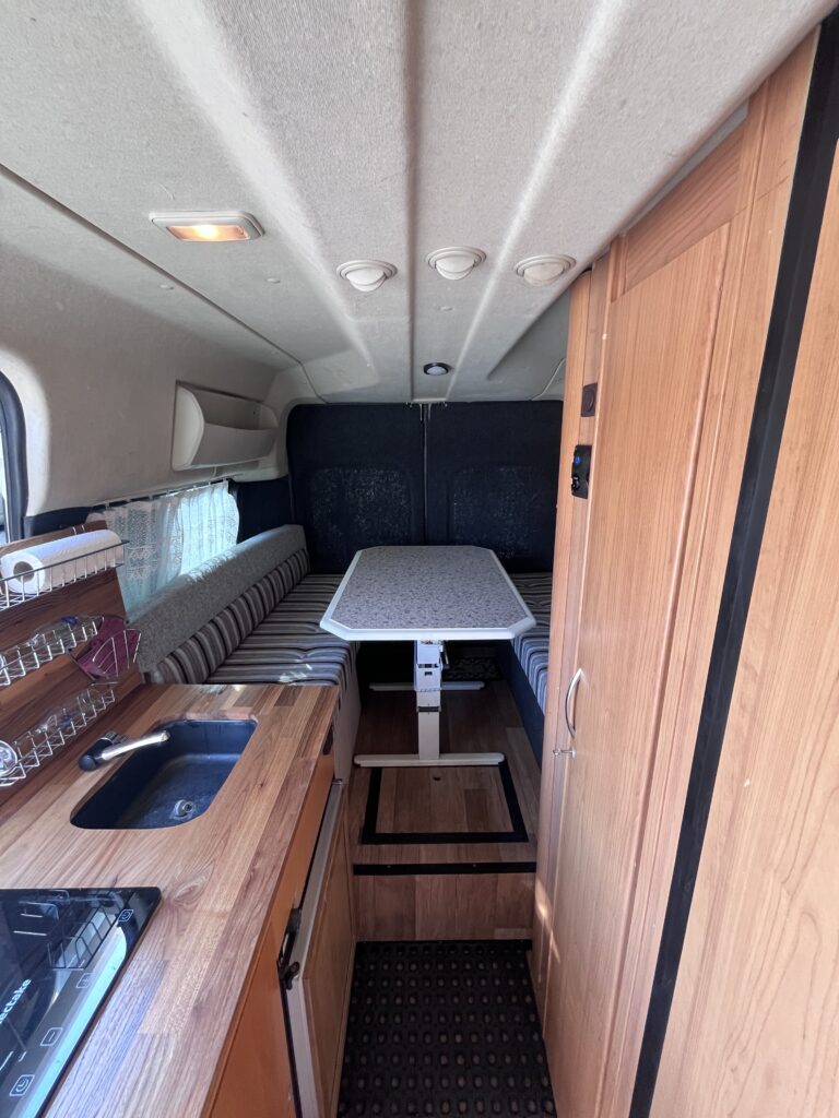 Peugeot Boxer 2014 campervan interior with convertible dining table