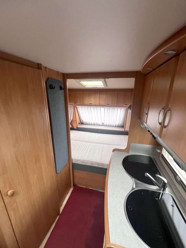 Hobby caravan kitchen and hallway leading to the double bed