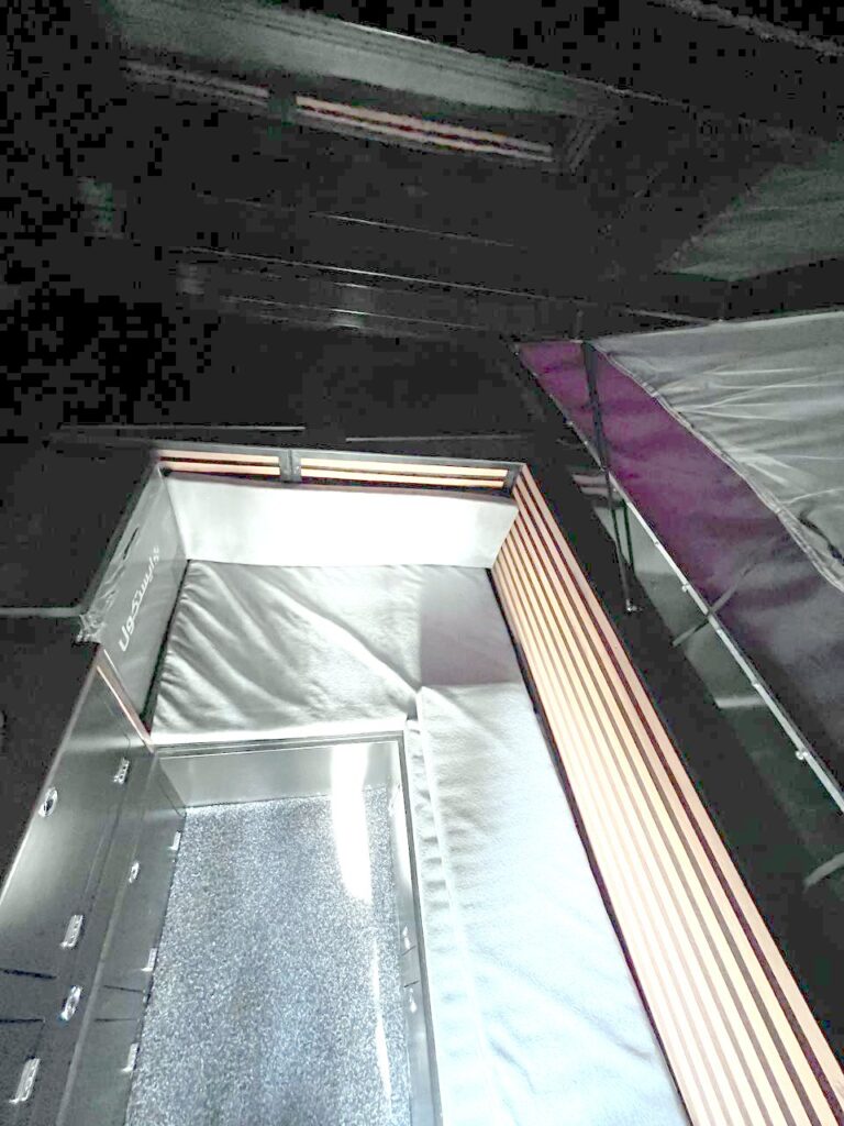 Simorgh truck camper bed and storage