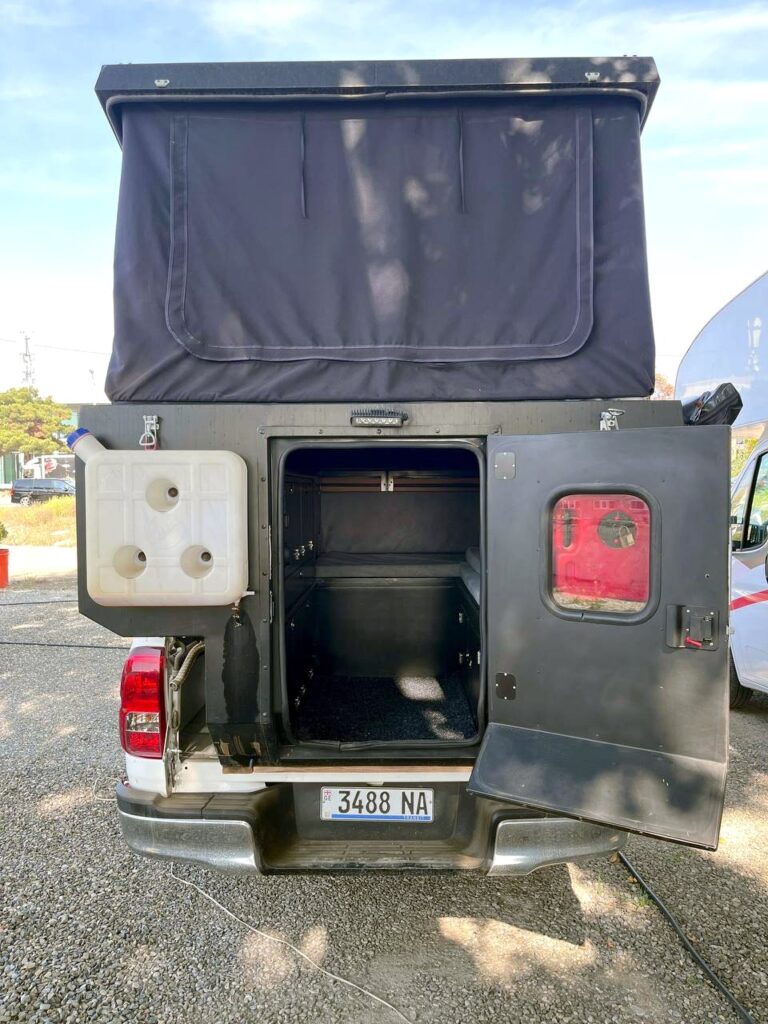 Simorgh truck camper rear entry door and living space
